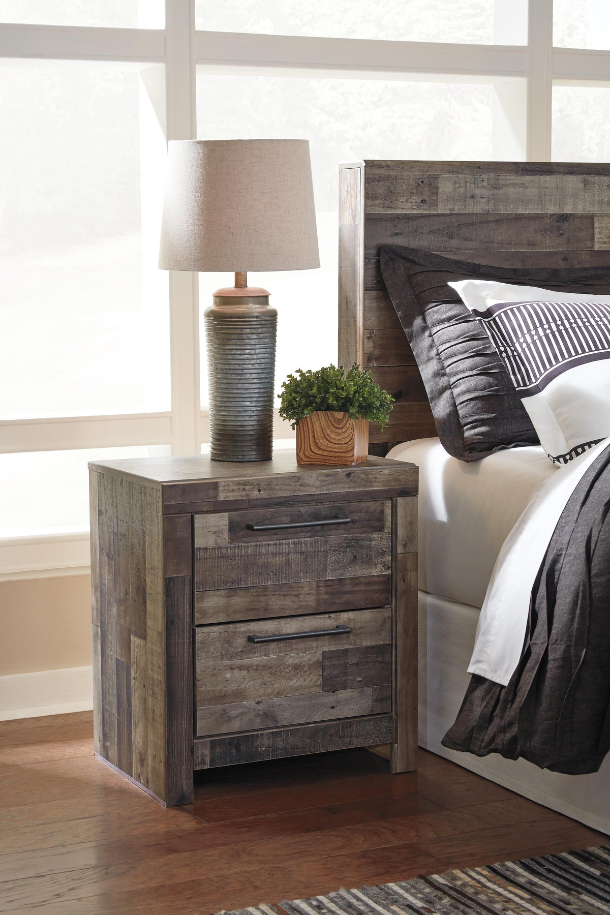 Derekson King Panel Storage Bed, Dresser, Mirror, Chest and Nightstand