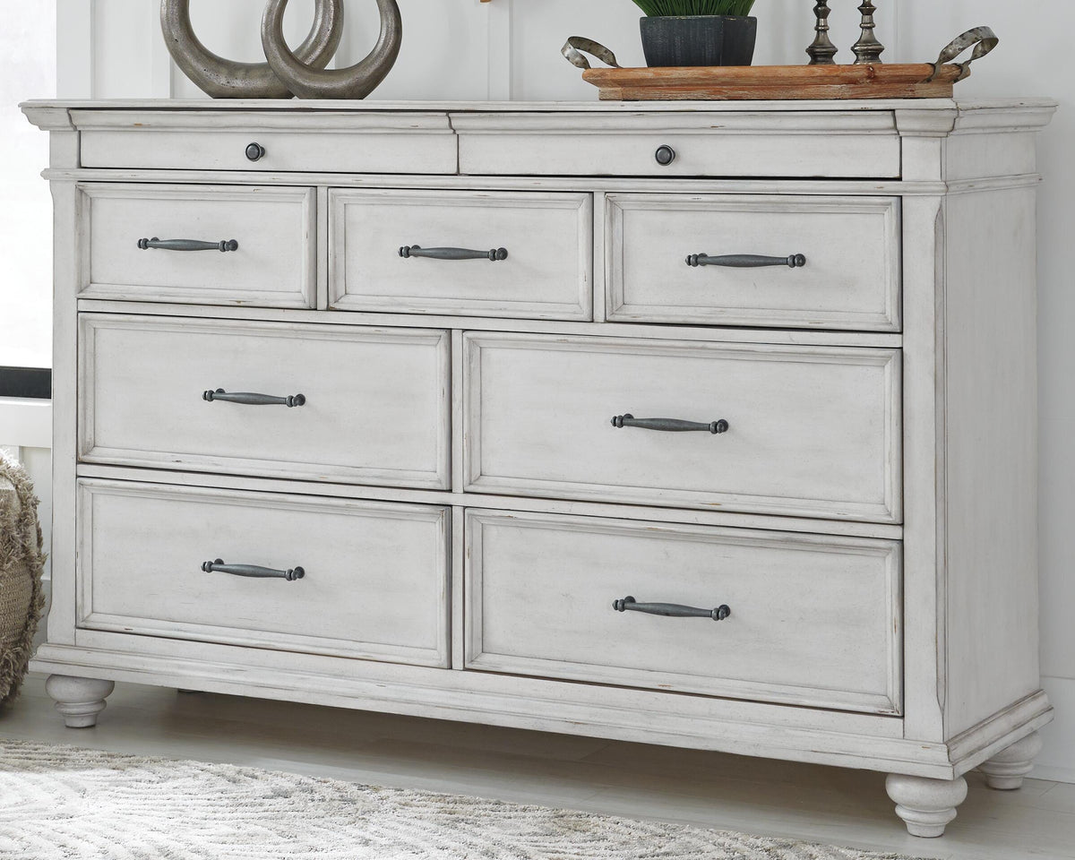 Kanwyn Queen Upholstered Panel Bed, Dresser, and Nightstand